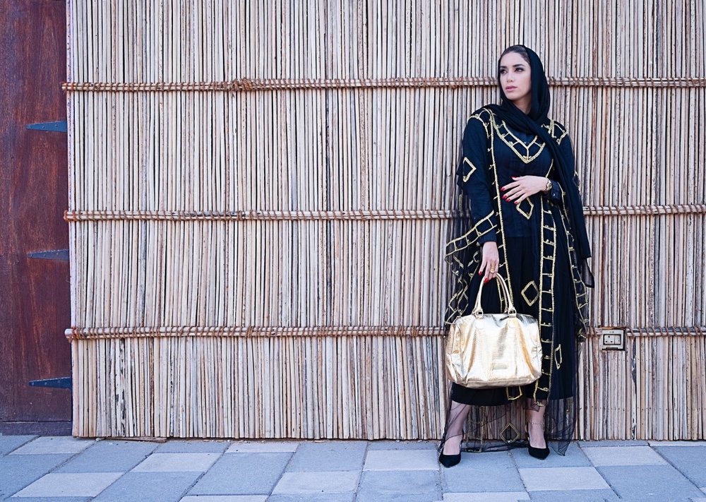 A model sports an elaborate abaya. Since 2010, it has been against the law to wear a face-covering veil in public. CREATIVE COMMONS.